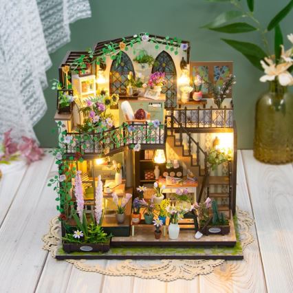 2Kids Toys - Miniatura domku Darcyin kwiatowy domek 2xAAA
