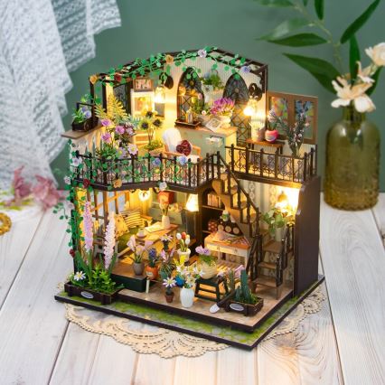 2Kids Toys - Miniatura domku Darcyin kwiatowy domek 2xAAA