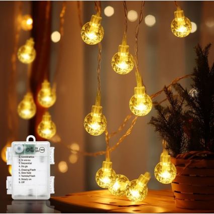 Aigostar - Zewnętrzny łańcuch LED 100xLED/3xAA/8 funkcji 10,3 m IP44 ciepła biel