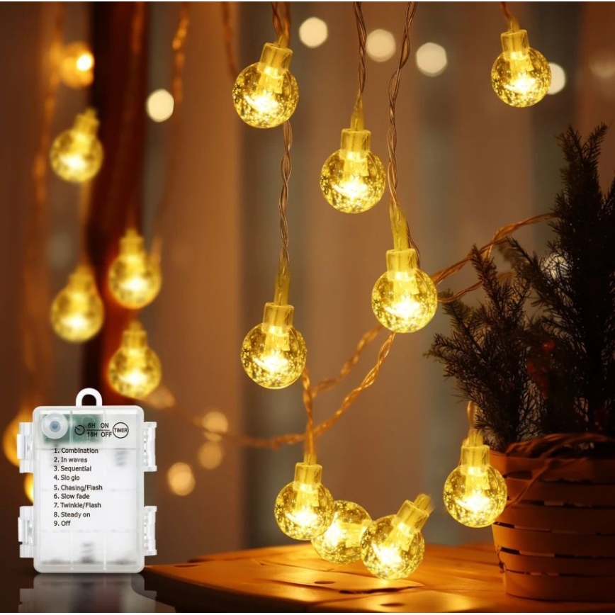 Aigostar - LED Zewnętrzny łańcuch bożonarodzeniowy 100xLED/3xAA/8 funkcji 10,3 m IP44 ciepła biel