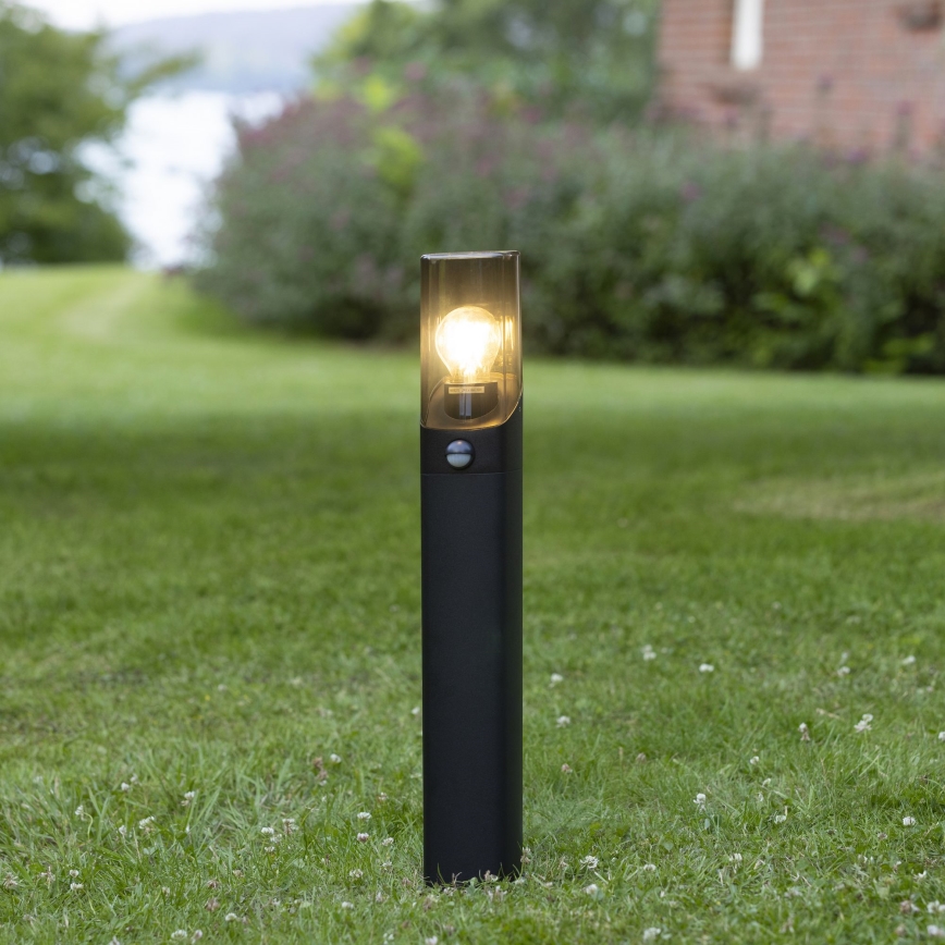 Brilliant - Lampa zewnętrzna z czujnikiem MINOU 1xE27/10W/230V IP44 czarna/dym