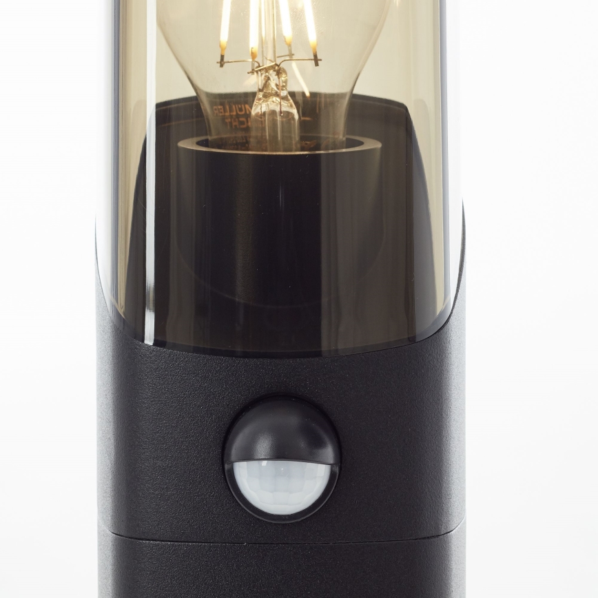 Brilliant - Lampa zewnętrzna z czujnikiem MINOU 1xE27/10W/230V IP44 czarna/dym
