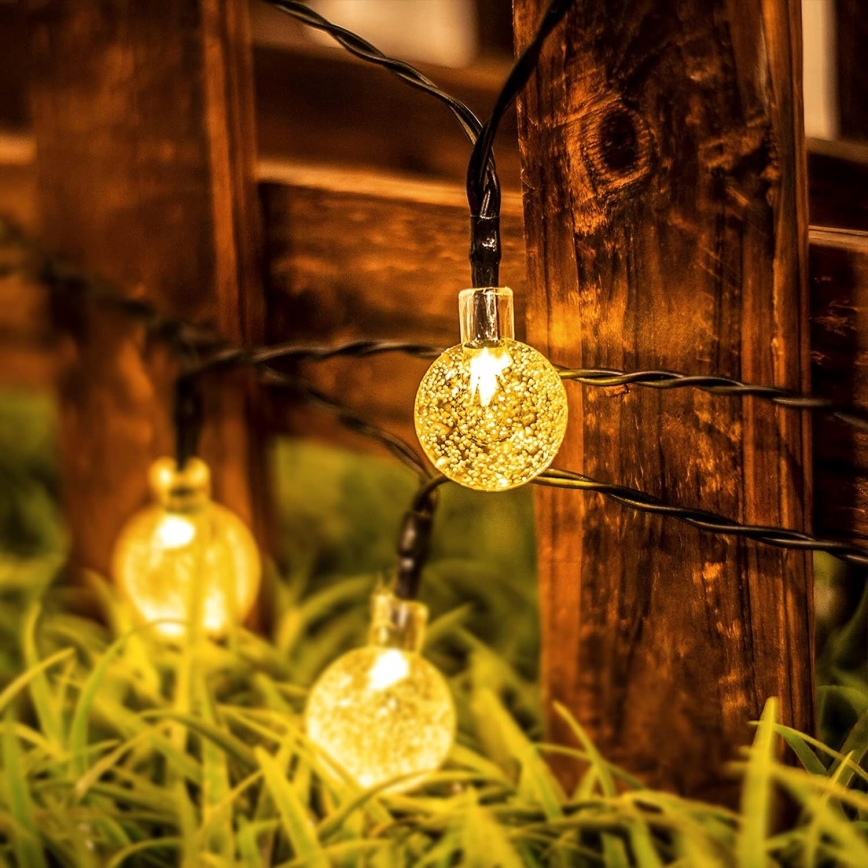 Dekoracyjny łańcuch solarny LED 50 diod / 8 funkcji 500 mAh 9,5 m IP67 ciepła biała