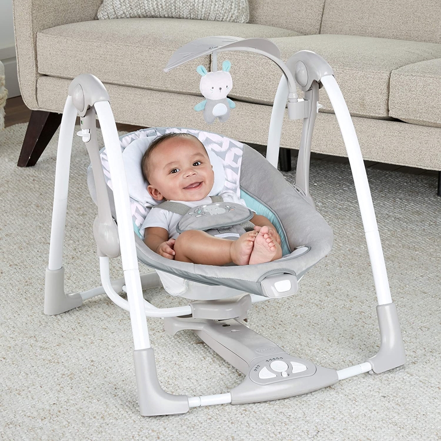 Ingenuity - Dziecięca huśtawka wibracyjna z muzyką 2w1 RAYLAN