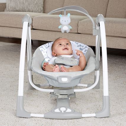 Ingenuity - Dziecięca huśtawka wibracyjna z muzyką 2w1 RAYLAN