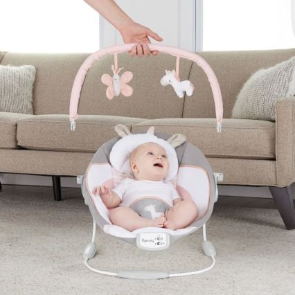 Ingenuity - Leżaczek wibracyjny dla dziecka z muzyką FLORA THE UNICORN 3xC