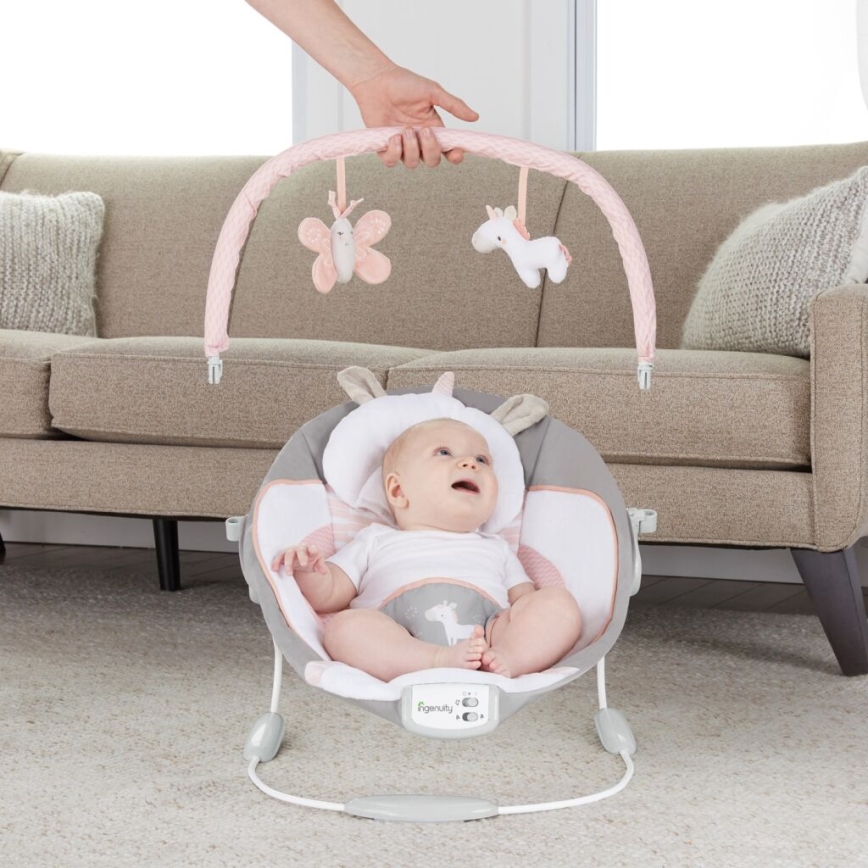 Ingenuity - Leżaczek wibracyjny dla dziecka z muzyką FLORA THE UNICORN 3xC