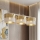 Lampa wisząca na linkach LUX 3xE27/15W/230V biało-złota