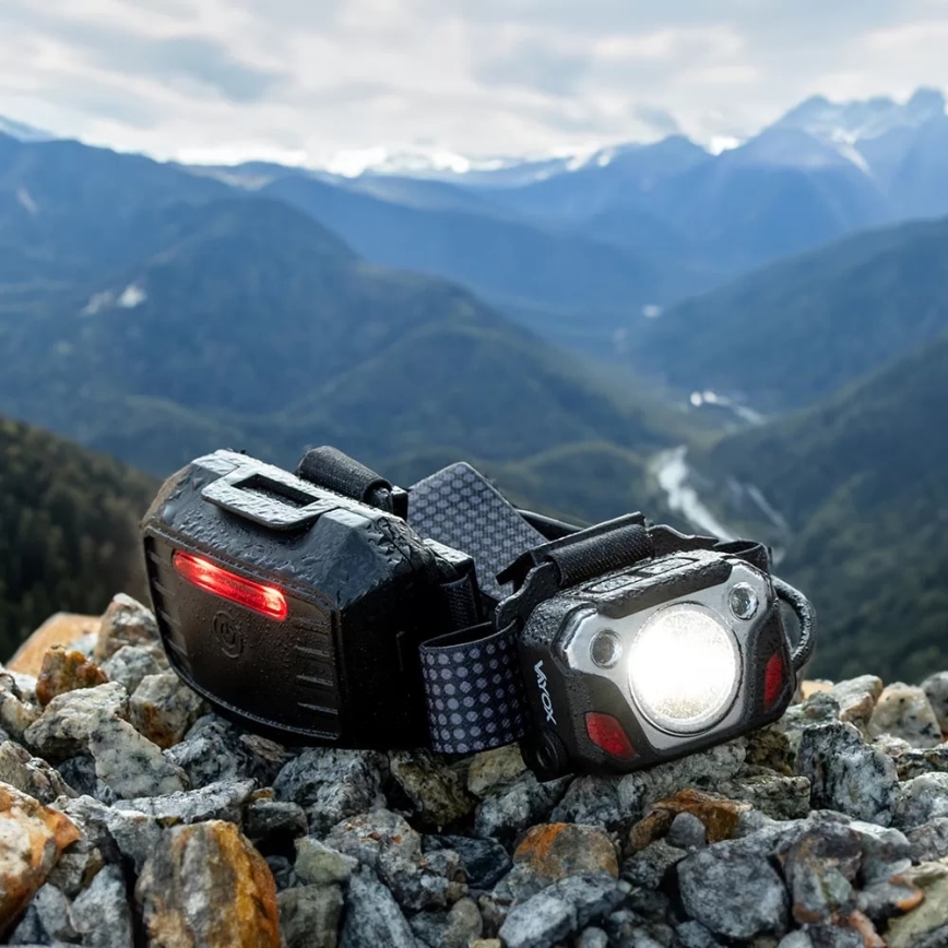 LED Ściemnialna akumulatorowa czołówka z czujnikiem z funkcją power banku i czerwone światło LED/10W/5V IP44 1200 błyszcz. 4000 mAh