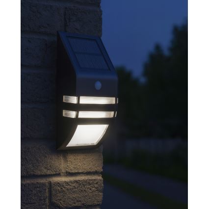 LED Solarna lampa ścienna z czujnikiem LED/3,7V 500 mAh IP44 czarna