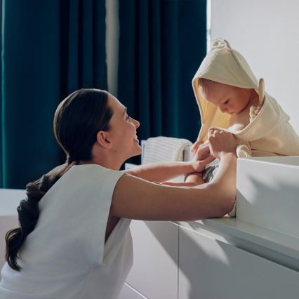 Lionelo - Muślinowy ręcznik dziecięcy z kapturem, beżowy (Sand)