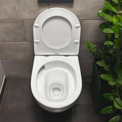 REA-C1259 - Wisząca miska WC z deską sedesową CARLO MINI TORNADO RIMLESS, ceramika / biały połysk