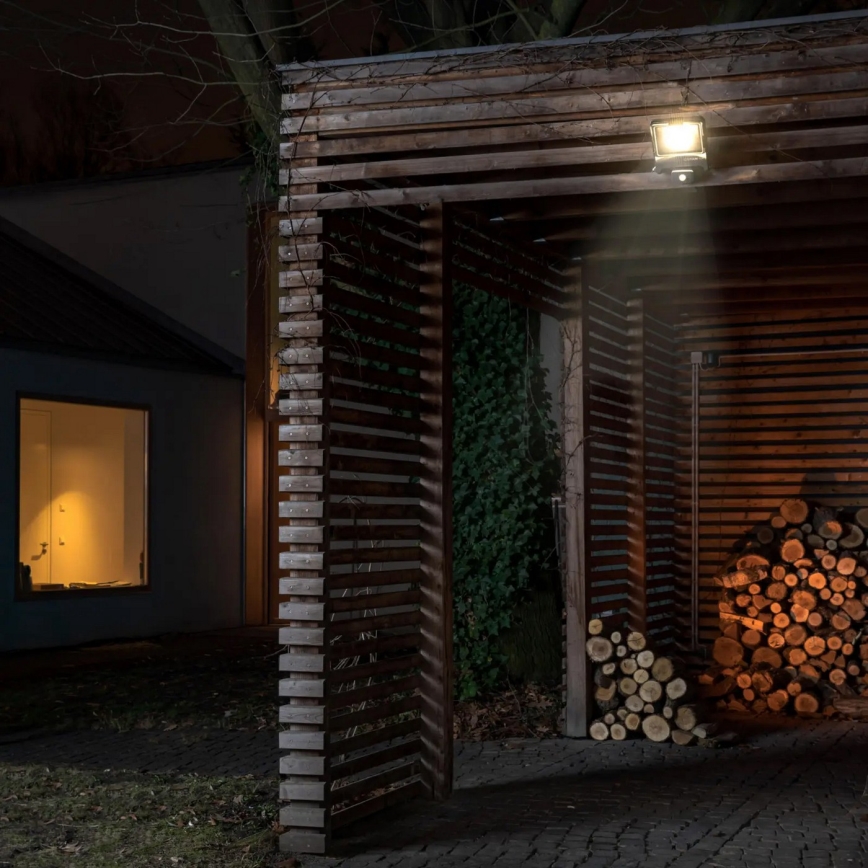 Reflektor zewnętrzny LED z czujnikiem ruchu i zmierzchu LED/100W/230V 4500K IP65 czarny