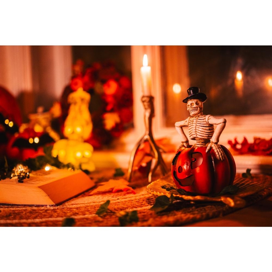 LED Dekoracja HALLOWEEN LED/2xLR44/ciepła biel szkielet w dyni żywica
