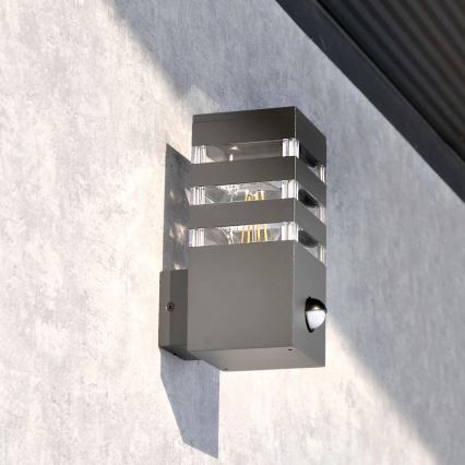 Zewnętrzna lampa ścienna z czujnikiem TEKSAS 1xE27/12W/230V IP44 antracyt