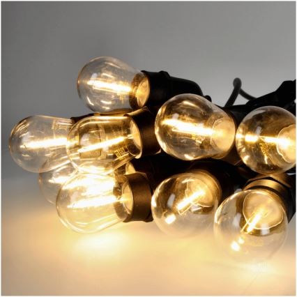 Zewnętrzny łańcuch dekoracyjny LED BAJA ST64 20xE27/1W/230V 20,9m IP44 ciepła biel