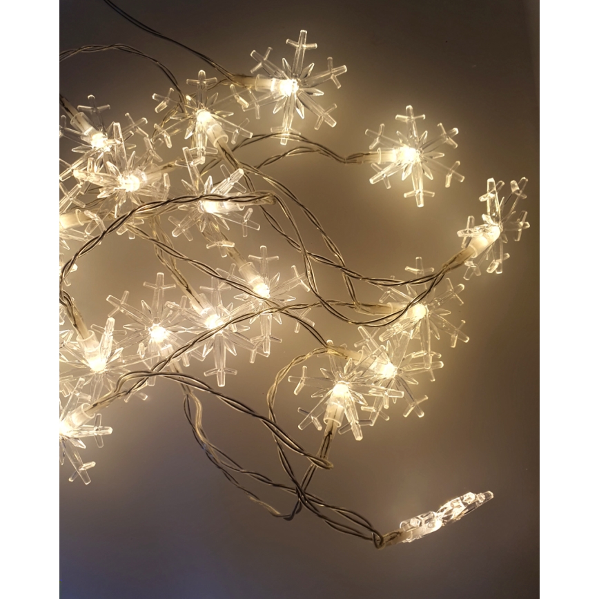 Zewnętrzny łańcuch LED 20xLED/2xAA 2,2 m IP44 ciepła biała śnieżynki